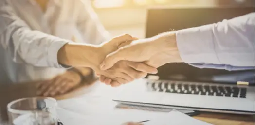 Lawyer reviewing legal documents with a client, representing professional legal services and consultation.