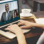 Wooden gavel resting on a legal document, symbolizing law, justice, and legal proceedings.