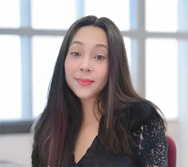 Professional headshot of Manuela, a team member at Legal Brand Marketing.