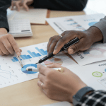 Law firm marketing team analyzing legal lead generation data in a conference room