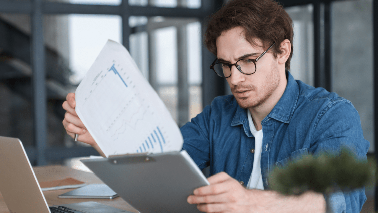 A lawyer reviewing lead generation fees and marketing ROI strategies on a digital dashboard.