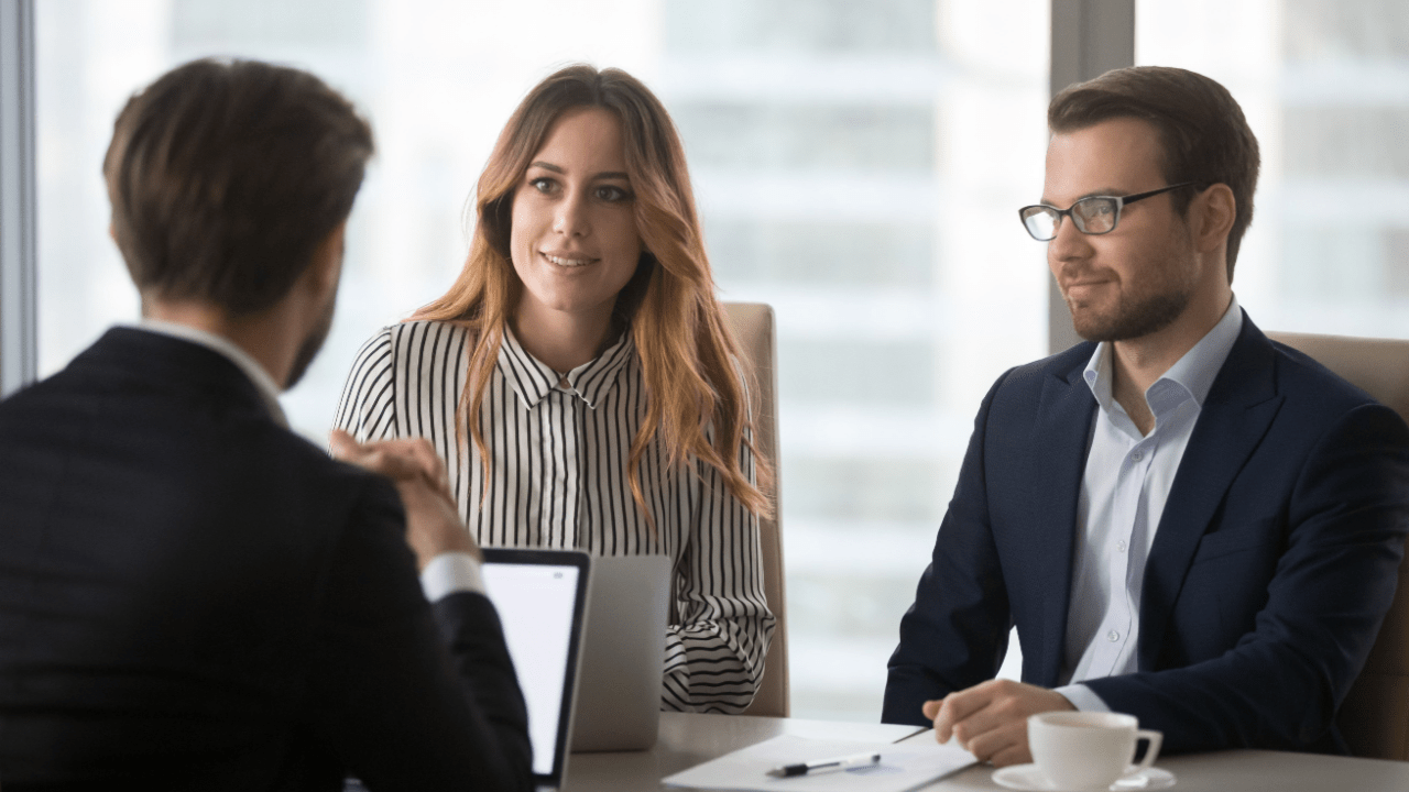 Legal marketing team discussing effective marketing strategies for bankruptcy lawyers in corporate meeting